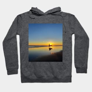 A silhouetted horse-drawn carriage on Parangtritis beach at sunset 4 Hoodie